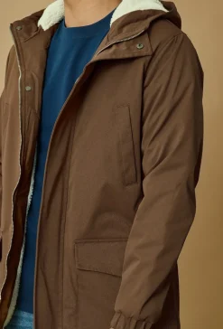 Veste parka milongue à capuche moumoutée