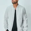 Veste teddy uni motifs géométriques