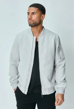 Veste teddy uni motifs géométriques