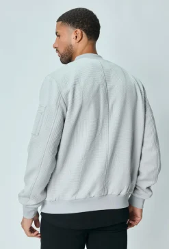 Veste teddy uni motifs géométriques