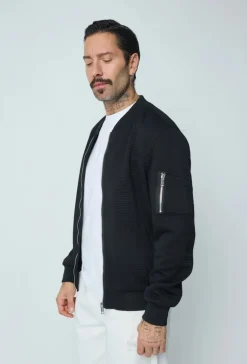 Veste teddy uni motifs géométriques
