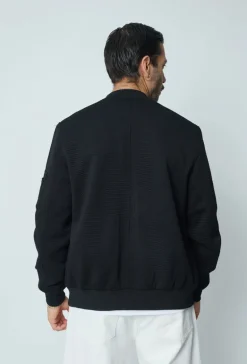 Veste teddy uni motifs géométriques
